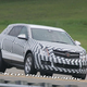 Illustration for article titled 2010 Cadillac SRX Spotted In Minimal, Super Chess Camo
